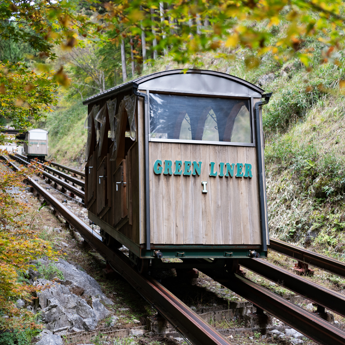 Riding a wooden cable car to Otaki Limestone cave